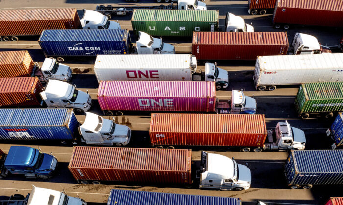 Trucks line up to enter a Port of Oakland shipping terminal in Oakland, Calif., on Nov. 10, 2021. (Noah Berger/AP Photo)