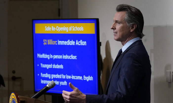 California Gov. Gavin Newsom speaks about his 2021–2022 state budget proposal during a news conference in Sacramento, Calif., on Jan. 8, 2021. (Rich Pedroncelli, Pool, File/AP Photo)