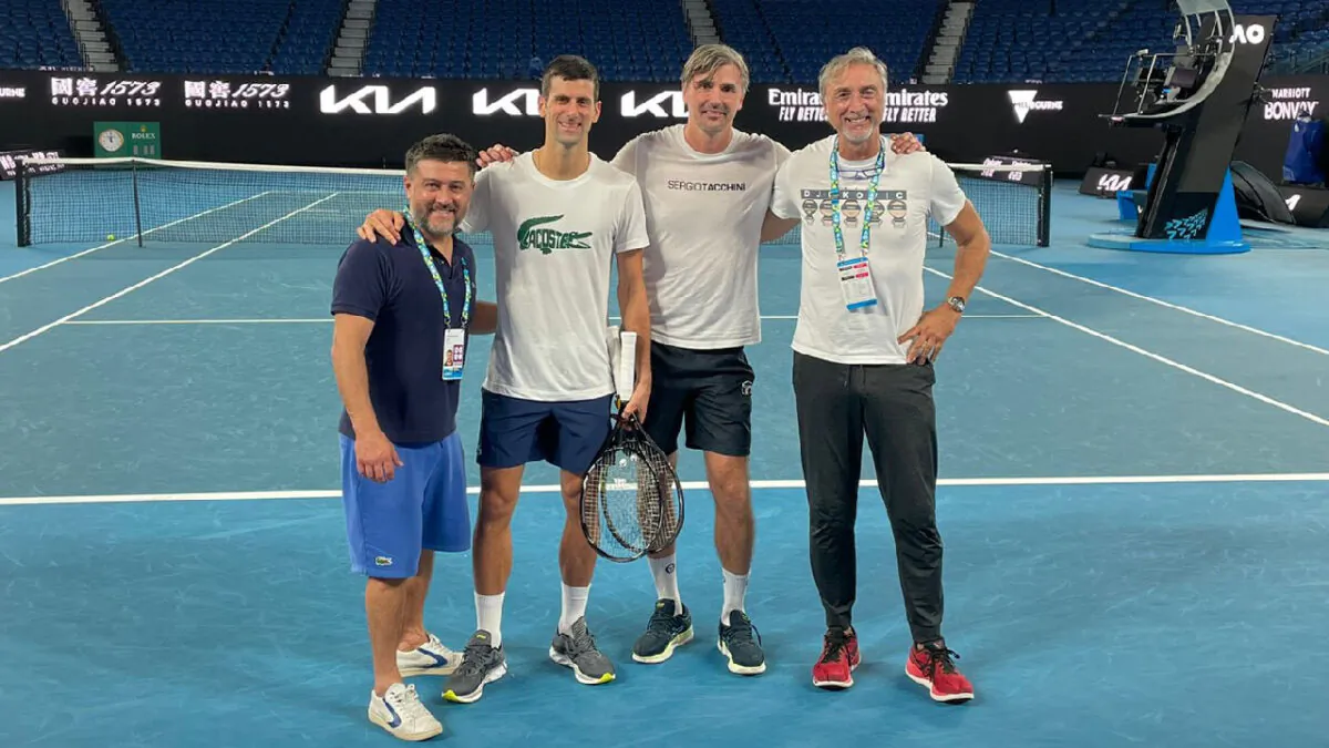 Serbian tennis player Novak Djokovic (2nd L) and his team on Rod Laver Arena Court at the Australian Open in Melbourne, Australia, in a photo uploaded to Twitter on Jan. 11, 2022. (Courtesy of DjokerNole/Twitter via Reuters)