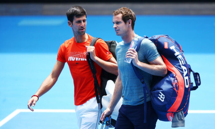 Novak Djokovic of Serbia talks with Andy Murray of Great Britain before their practice match ahead of the 2019 Australian Open at Melbourne Park, Australia, on Jan. 10, 2019. (Michael Dodge/Getty Images)