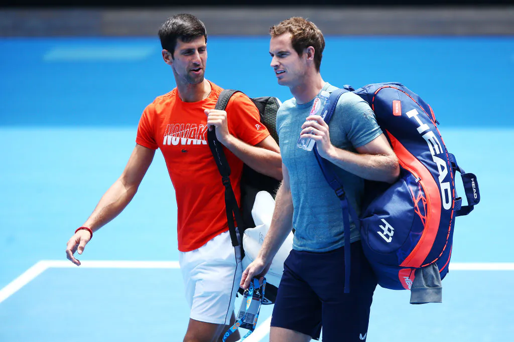 Novak Djokovic of Serbia talks with Andy Murray of Great Britain before their practice match ahead of the 2019 Australian Open at Melbourne Park, Australia, on Jan. 10, 2019. (Michael Dodge/Getty Images)