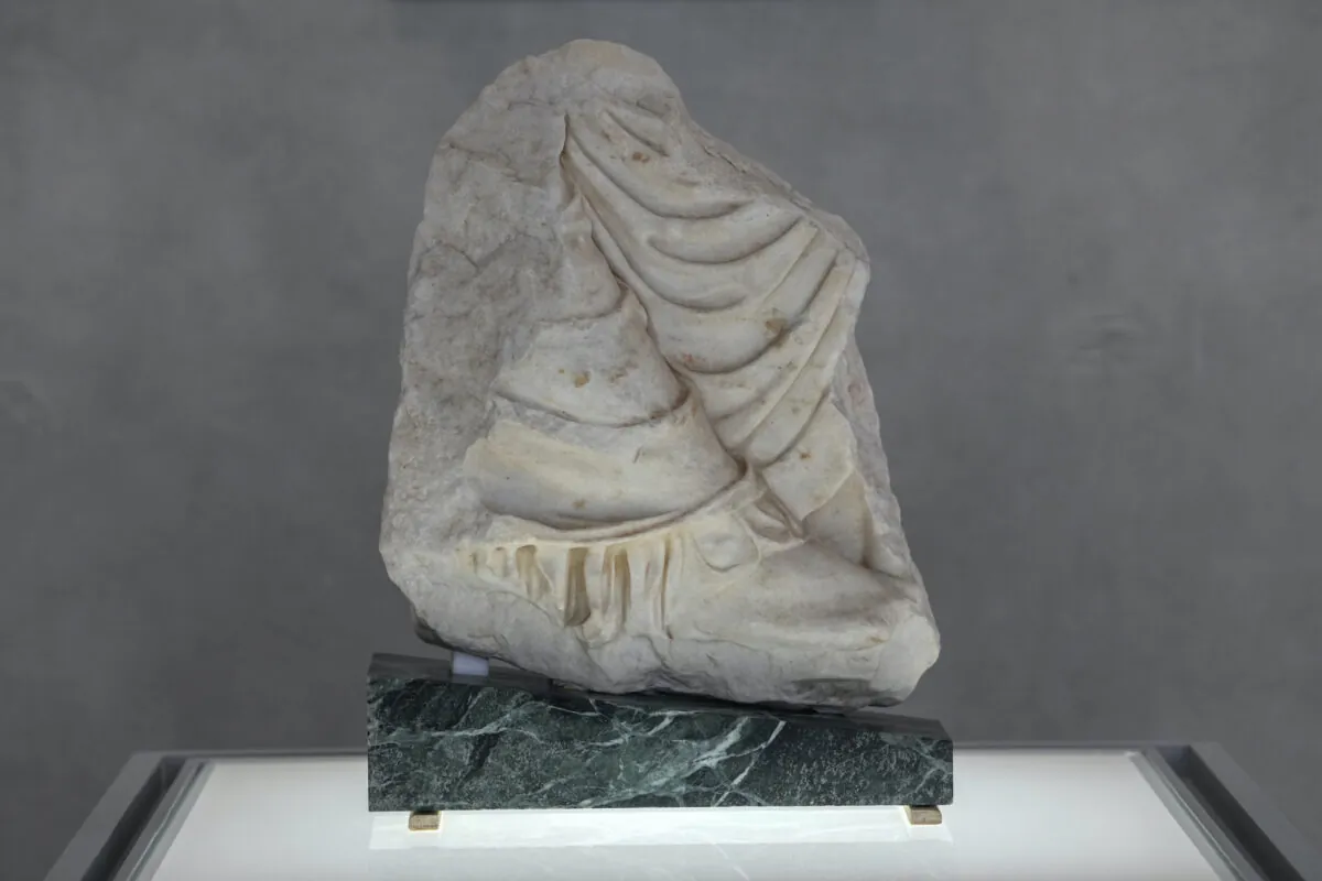 A Parthenon fragment, on loan from the Antonino Salinas Regional Archaeological Museum of Palermo, at the Acropolis Museum, in Athens, on Jan. 10, 2022. (Thanassis Stavrakis/AP Photo)
