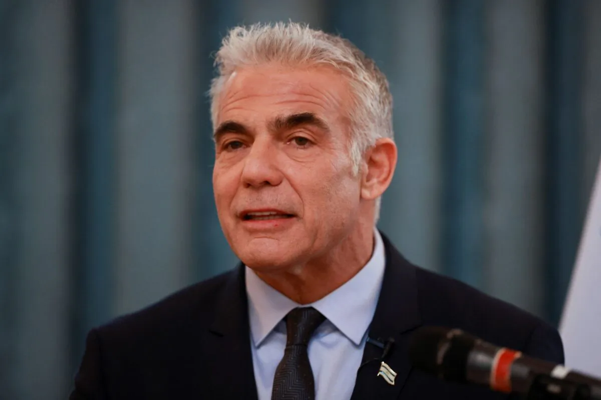 Israeli Foreign Minister Yair Lapid attends a news conference with Britain's Foreign Secretary Liz Truss at the Foreign Commonwealth & Development Office in London, Britain on Nov. 29, 2021. (Hannah McKay/Reuters)
