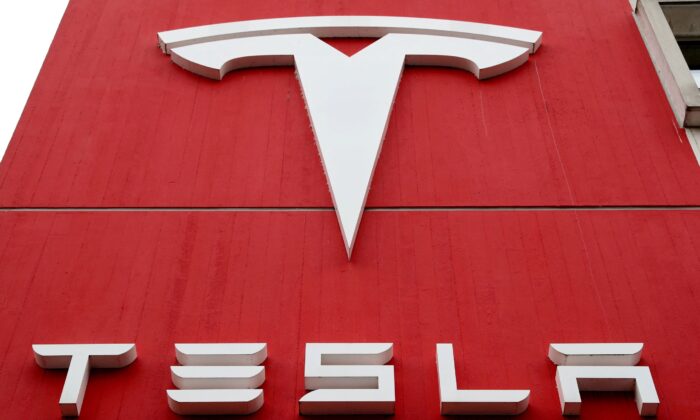 The logo of car manufacturer Tesla is seen at a branch office in Bern, Switzerland, on Oct. 28, 2020. (Arnd Wiegmann/Reuters)