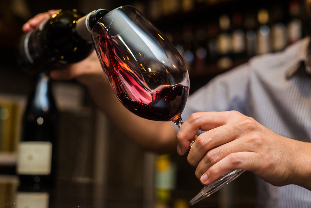 Blended red wines range all over the place both in terms of style and quality, and prices can vary from very reasonable to outrageous. (Krilerg saragorn/Shutterstock)