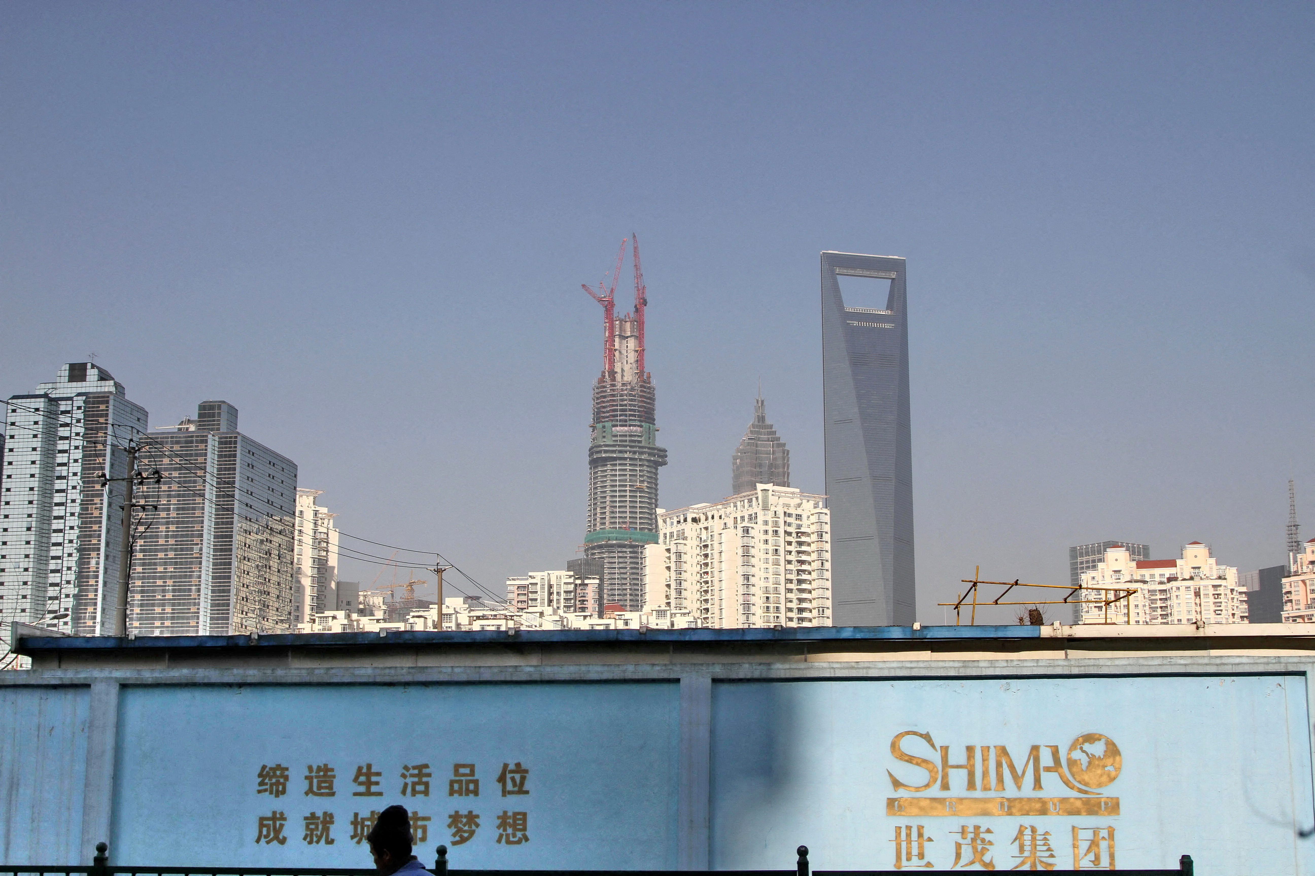 Shimao's Default Deepens Concerns Over Cash Crunch in Chinese Real Estate Industry - Vimarsana News