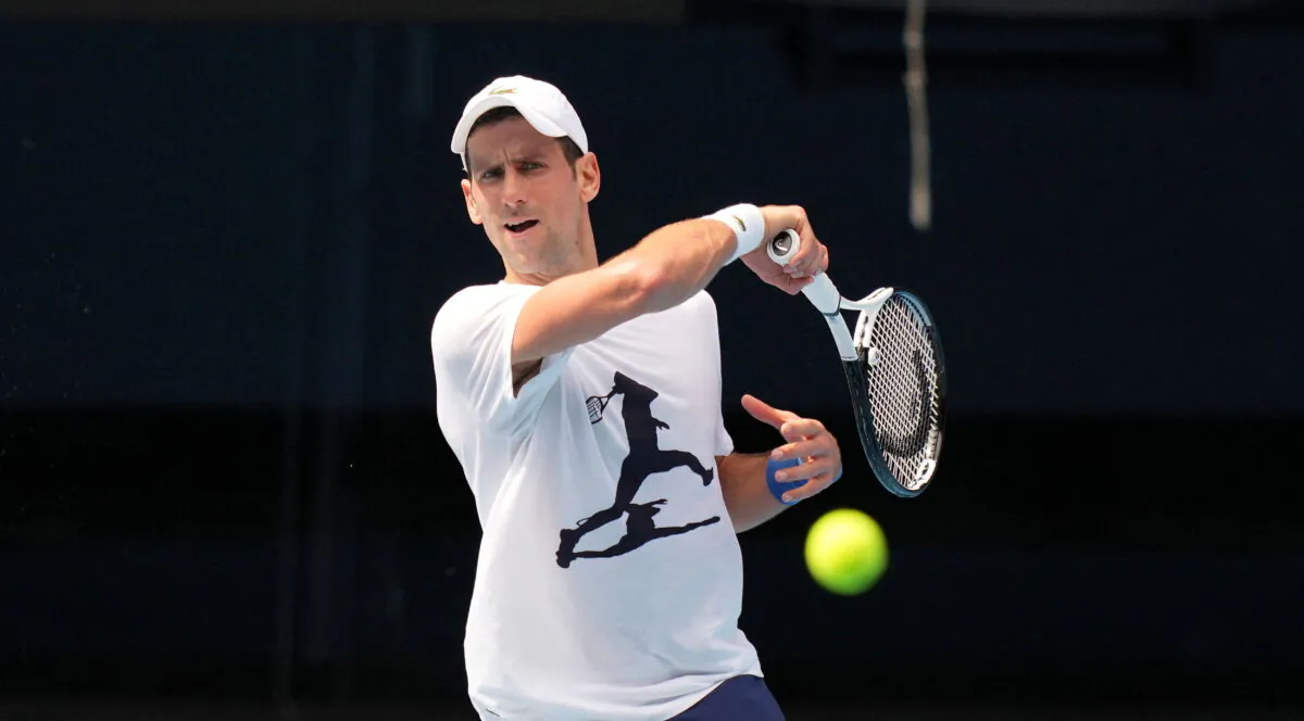 Serbian tennis player Novak Djokovic practices ahead of the Australian Open at Melbourne Park in Melbourne, on Jan. 11, 2022. (Tennis Australia/Scott Barbour/Handout via Reuters)