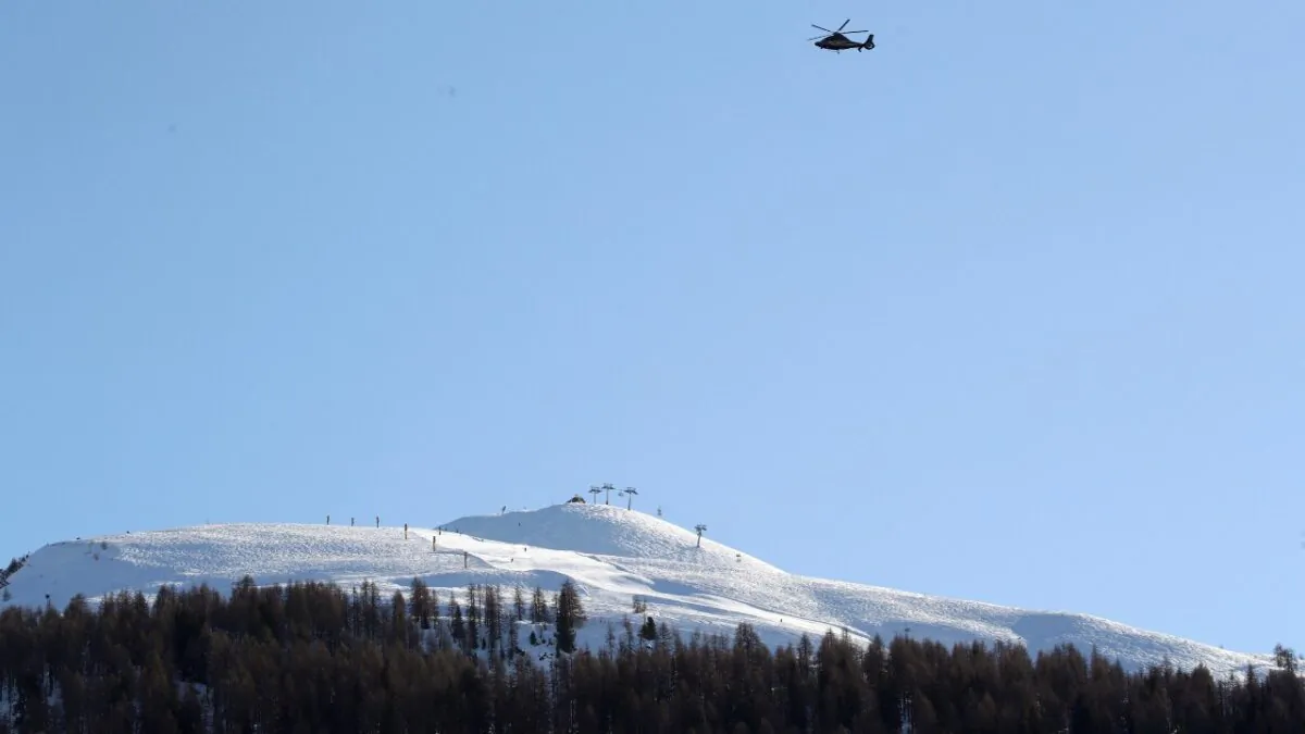 A helicopter flies over the ski resort during the 50th World Economic Forum (WEF) annual meeting in Davos, Switzerland, on Jan. 23, 2020. (Denis Balibouse/Reuters)