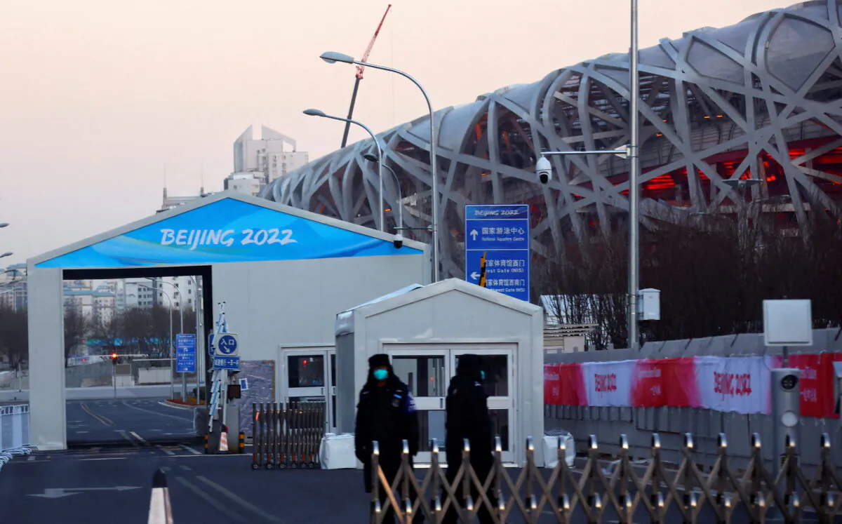 A car checkpoint in front of the National Stadium, also known as the Bird's Nest, where the opening and closing ceremonies of Beijing 2022 Winter Olympics will be held in Beijing, on Jan. 11, 2022. (Fabrizio Bensch/Reuters)