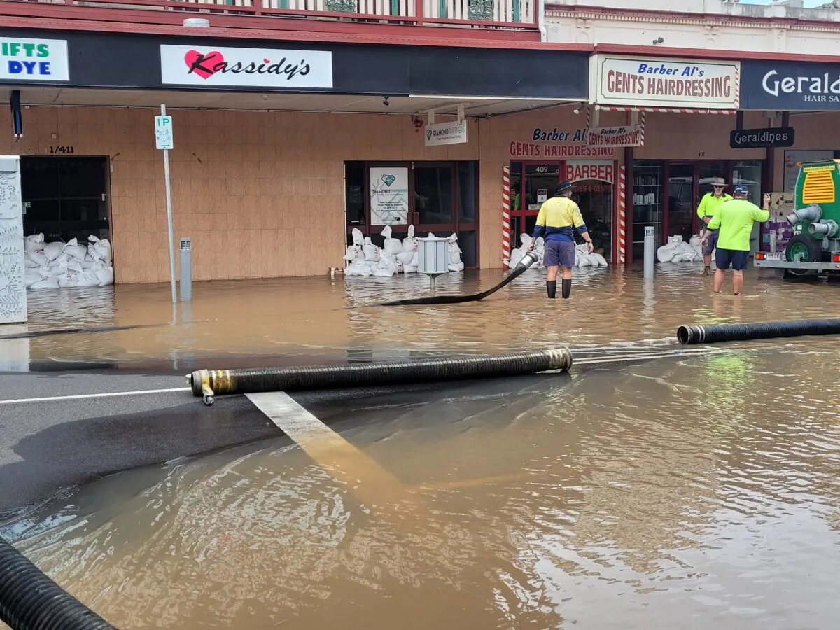 A supplied image obtained Monday, January 10, 2022 shows floodwaters impacting businesses in Maryborough, north of Brisbane, in the wake of former tropical cyclone Seth. (AAP Image/Supplied by Rapid Relief Team) 