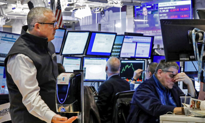 A trader on the floor of the New York Stock Exchange, Thursday, March 12, 2020.  on Wall Street. (Richard Drew/AP Photo)