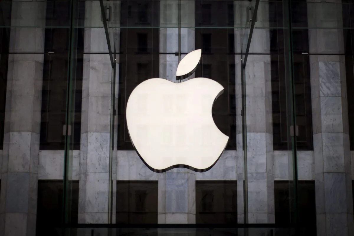 An Apple logo hangs above the entrance to the Apple store on 5th Avenue in the Manhattan borough of New York City, on July 21, 2015. (Mike Segar/Reuters)
