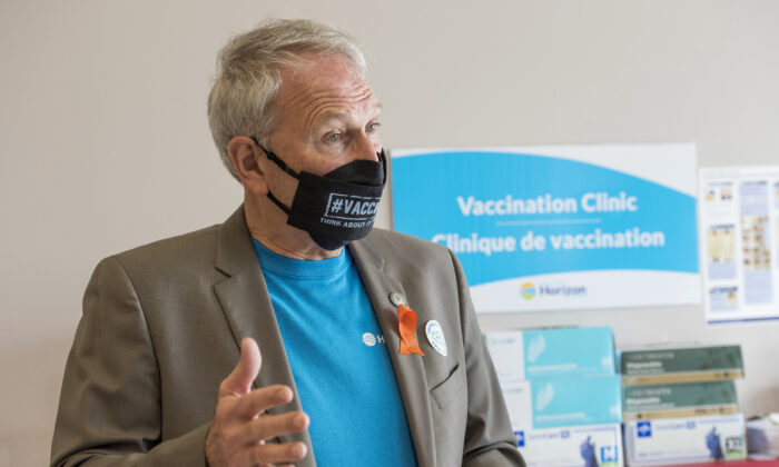 New Brunswick Premier Blaine Higgs speaks with the media after receiving his second dose of the Oxford-AstraZeneca COVID-19 vaccine in Fredericton, on June 4, 2021. (The Canadian Press/Stephen MacGillivray)