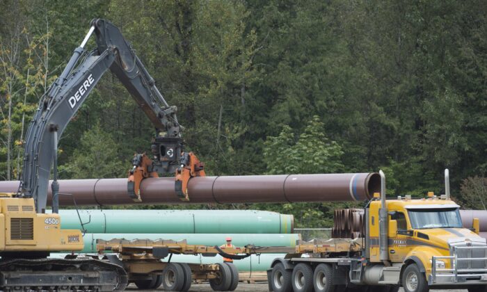 Pipeline pipes are seen at a Trans Mountain facility near Hope, B.C., Aug. 22, 2019. (The Canadian Press/Jonathan Hayward)