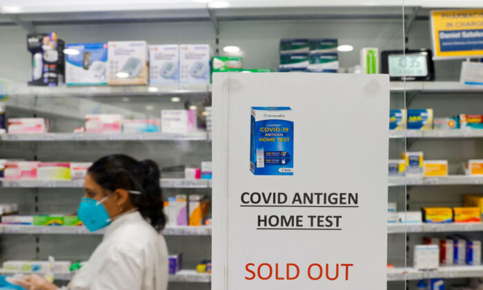 A sign indicating sold out rapid antigen tests is posted in a Balgowlah pharmacy in Sydney, Australia, on Jan. 10, 2022.(Jenny Evans/Getty Images)