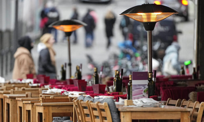 An empty restaurant waits for customers in Cologne, Germany, on Jan. 7, 2022. (Martin Meissner/AP Photo)