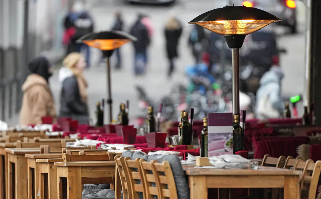 An empty restaurant waits for customers in Cologne, Germany, on Jan. 7, 2022. (Martin Meissner/AP Photo)