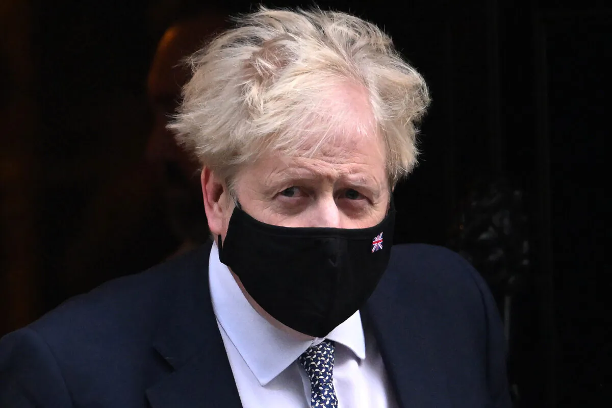 Prime Minister Boris Johnson leaves 10 Downing Street for Prime Minister’s Questions in the House of Commons, on Jan. 12, 2022. (Leon Neal/Getty Images)