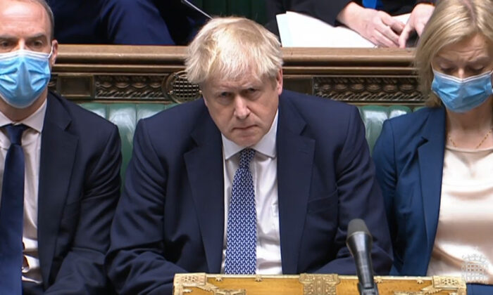 Prime Minister Boris Johnson during Prime Minister's Questions in the House of Commons, London, on Jan. 12, 2022. (House of Commons/PA) 