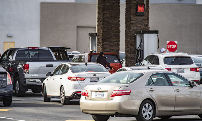 People wait in lines for gasoline at Costco Wholesale in Tustin, Calif., on Jan. 12, 2022. (John Fredricks/The Epoch Times)