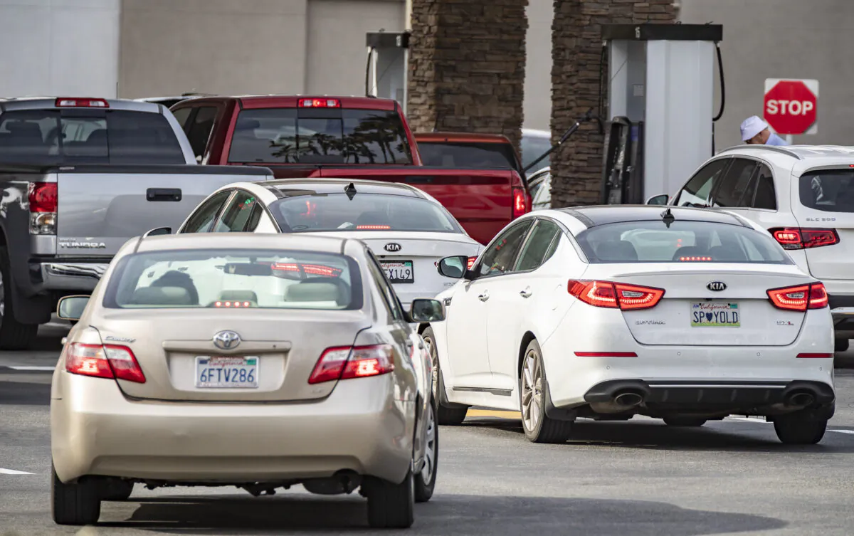 People wait in lines for gasoline at Costco Wholesale in Tustin, Calif., on Jan. 12, 2022. (John Fredricks/The Epoch Times)