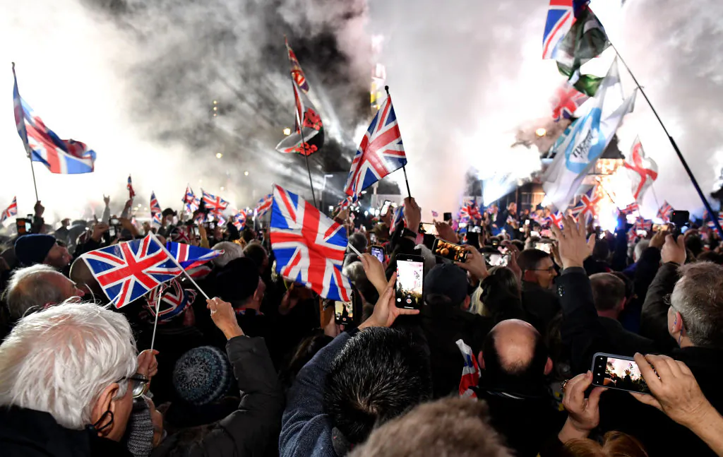 Pro Brexit supporters celebrates as the United Kingdom exits the EU during the Brexit Day Celebration Party hosted by Leave Means Leave at Parliament Square in London, England, on Jan. 31, 2020. (Jeff J Mitchell/Getty Images)