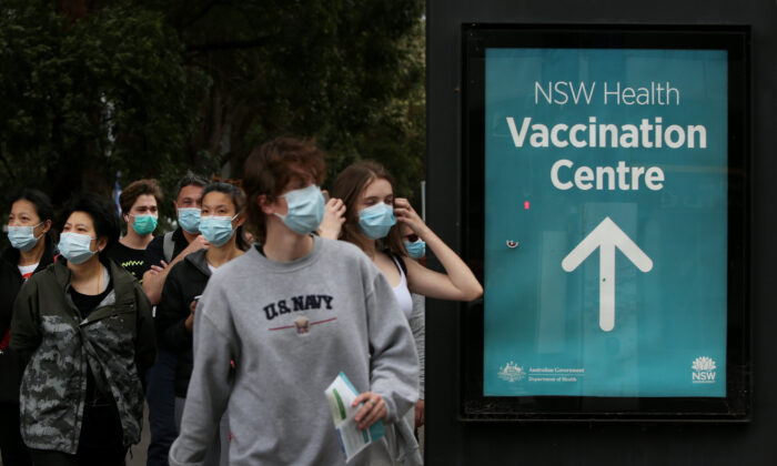 People arrive to be vaccinated at the New South Wales Health mass vaccination hub at Homebush in Sydney, Australia, on Aug. 23, 2021. (Lisa Maree Williams/Getty Images)