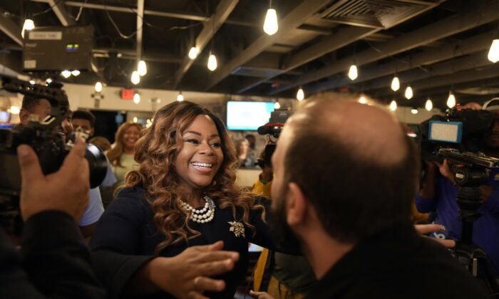 Democrat Sheila Cherfilus-McCormick greets supporters as she arrives at an election night party in Fort Lauderdale, Fla., on Jan. 11, 2022. (Rebecca Blackwell/AP Photo)