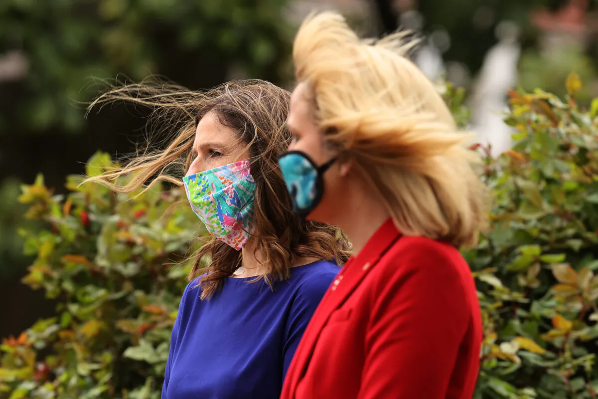 Maryland Labor Secretary Tiffany Robinson and Commerce Secretary Kelly Schulz attend a news conference with Governor Larry Hogan in front of the Maryland State House in Annapolis, Md., on April 17, 2020. (Chip Somodevilla/Getty Images)