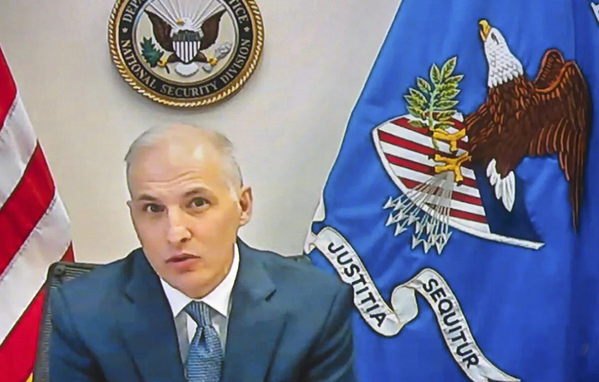 Assistant Attorney General for National Security Division Matthew Olsen, seen from a video monitor, testifies before a Senate Judiciary Committee during a virtual hearing to examine the domestic terrorism threat, in Washington, on Jan. 10, 2022. (Manuel Balce Ceneta/AP Photo)