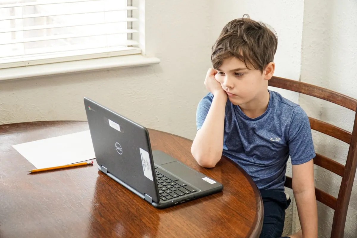 Too much screen time is depriving young boys of the opportunity to develop real world skills, and interpersonal skills. (Thomas Park/Unsplash)