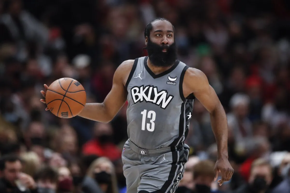 Brooklyn Nets guard James Harden (13) dribbles the ball up court against the Chicago Bulls during the second half at United Center in Chicago, on Jan. 12, 2022. (Kamil Krzaczynski-USA TODAY Sports via Field Level Media)