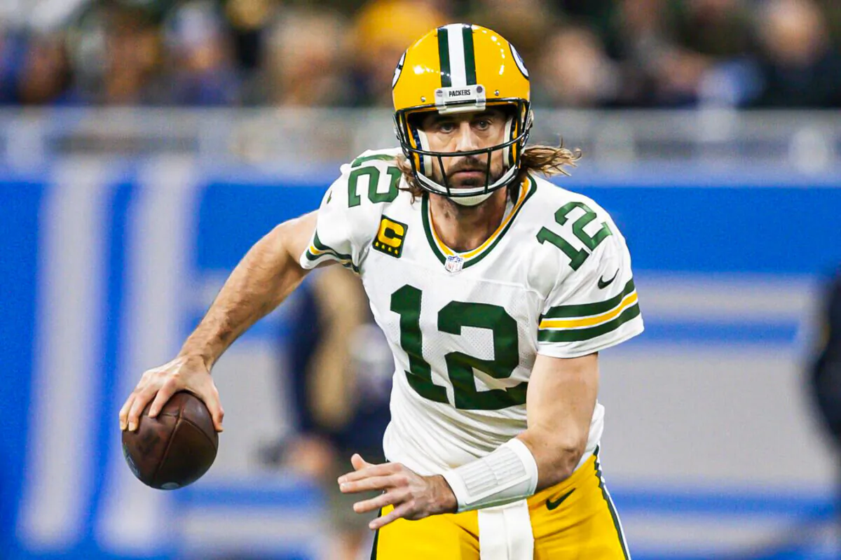 Green Bay Packers quarterback Aaron Rodgers (12) runs the ball during the first quarter against the Detroit Lions at Ford Field, in Detroit, on Jan 9, 2022. (Raj Mehta/USA TODAY Sports via Field Level Media)