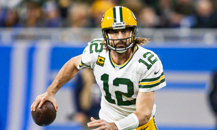 Green Bay Packers quarterback Aaron Rodgers (12) runs the ball during the first quarter against the Detroit Lions at Ford Field, in Detroit, on Jan 9, 2022. (Raj Mehta/USA TODAY Sports via Field Level Media)