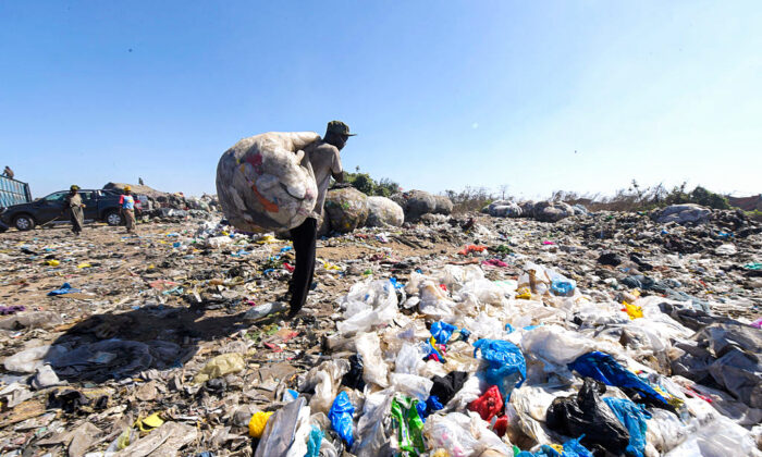 Plastic trash is dumped at the Mbeubeuss landfill on January 5, 2016 in Dakar, Senegal, where a new law prohibits the use of certain plastic bags. The implementation of the measure was launched on January 4, 2016 in Dakar in a campaign for a period of one week in an effort to clean up cities and raise awareness of the need to rid the environment of these pollutants.  AFP PHOTO /  SEYLLOU / AFP / SEYLLOU        (Photo credit should read SEYLLOU/AFP/Getty Images)