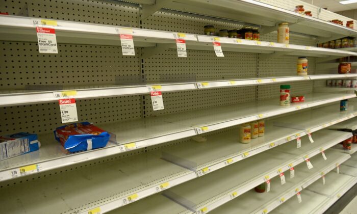 Nearly empty shelves are seen in a market in the Brooklyn Borough of New York City on March 16, 2020. (Angela Weiss/Getty Images)