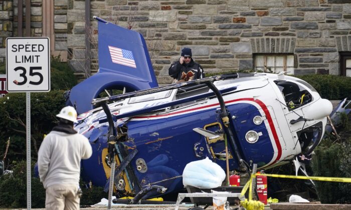 A medical helicopter rests next to the Drexel Hill United Methodist Church after it crashed the day before in the Drexel Hill section of Upper Darby, Pa., on Jan. 12, 2022. (Matt Rourke/AP Photo)
