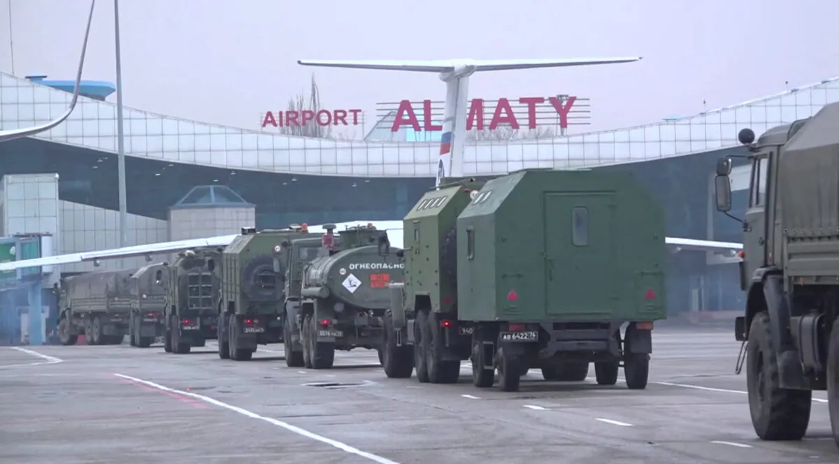 Russian military vehicles drives upon arrival at Almaty airport, as part of a peacekeeping mission of the Collective Security Treaty Organisation, in Almaty, Kazakhstan, in this still image from video released by Russia's Defence Ministry, on Jan. 9, 2022. (Russian Defence Ministry/ via Reuters)