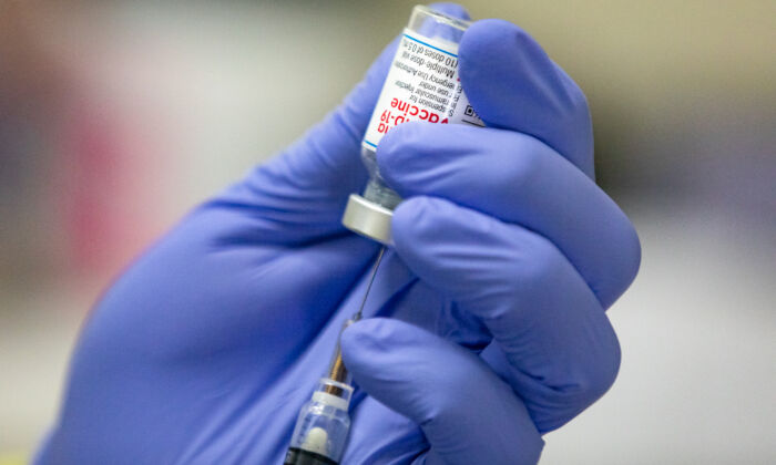 The COVID-19 Moderna Vaccination prepared at Lestonnac Free Clinic in Orange, Calif., on March 9, 2021. (John Fredricks/The Epoch Times)