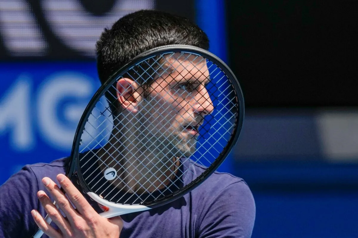 Defending men's champion Serbia's Novak Djokovic practices on Rod Laver Arena ahead of the Australian Open tennis championship in Melbourne, Australia, on Jan. 12, 2022. (Mark Baker/AP Photo)