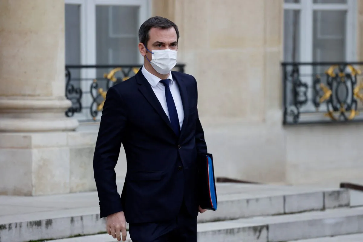 France's Health Minister Olivier Veran walks after taking part in the weekly cabinet meeting at The Elysee Presidential Palace in Paris, France, on Dec. 15, 2021. (Ludovic Marin/AFP via Getty Images)