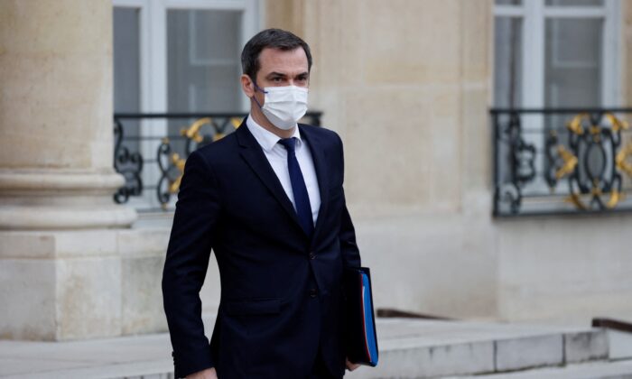 France's Health Minister Olivier Veran walks after taking part in the weekly cabinet meeting at The Elysee Presidential Palace in Paris, France, on Dec. 15, 2021. (Ludovic Marin/AFP via Getty Images)