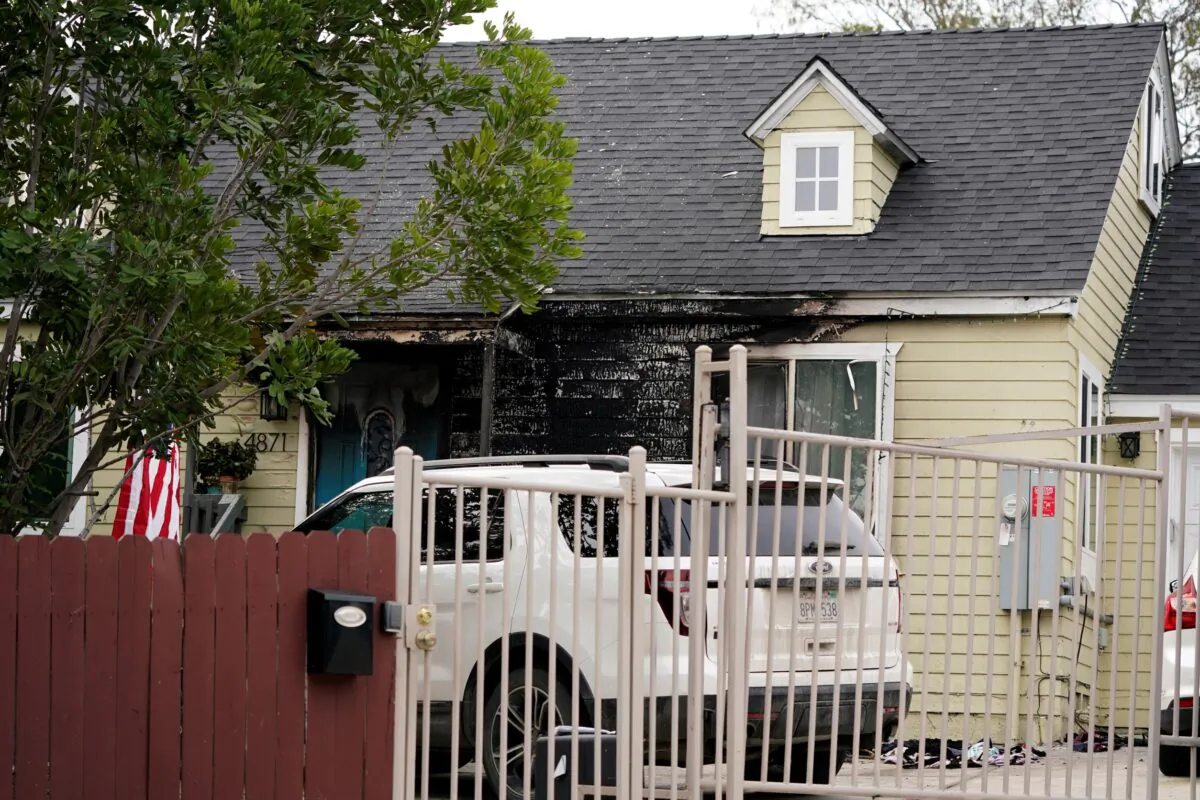 Fire damage covers the front of the house of San Diego County Supervisor Nathan Fletcher in San Diego, on Jan. 12, 2022. (Gregory Bull/AP Photo)