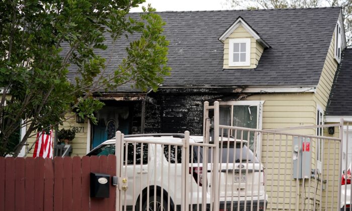 Fire damage covers the front of the house of San Diego County Supervisor Nathan Fletcher in San Diego, on Jan. 12, 2022. (Gregory Bull/AP Photo)
