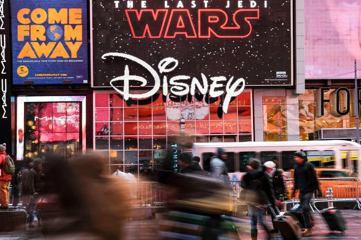The Disney logo is displayed outside the Disney Store in Times Square, New York City, on Dec. 14, 2017. (Drew Angerer/Getty Images)