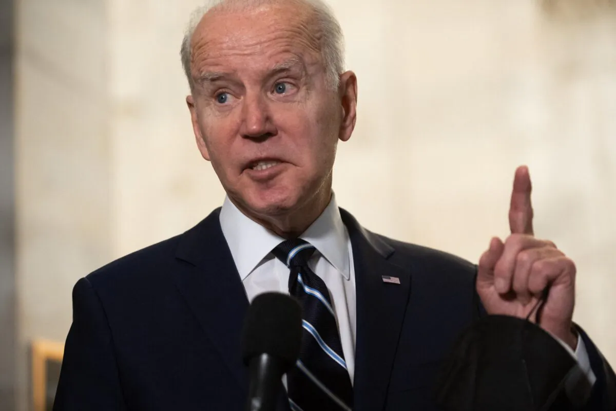 President Joe Biden speaks to reporters on Capitol Hill in Washington on Jan. 13, 2022. (Saul Loeb/AFP via Getty Images)