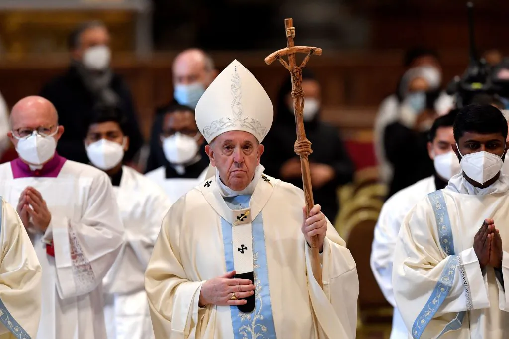 Pope Francis leaves at the end of the New Year's day mass in St. Peter's Basilica at Vatican City, on Jan. 1, 2022. (Tiziana Fabi/AFP via Getty Images)