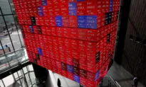 Asian Shares Fall on Fed Officials’ Hawkish Policy Stance