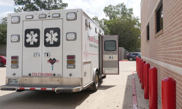 An ambulance is parked outside the Bellville Medical Center after dropping off a patient, in Bellville, Texas, on Sept. 1, 2021. (Francois Picard/AFP via Getty Images)