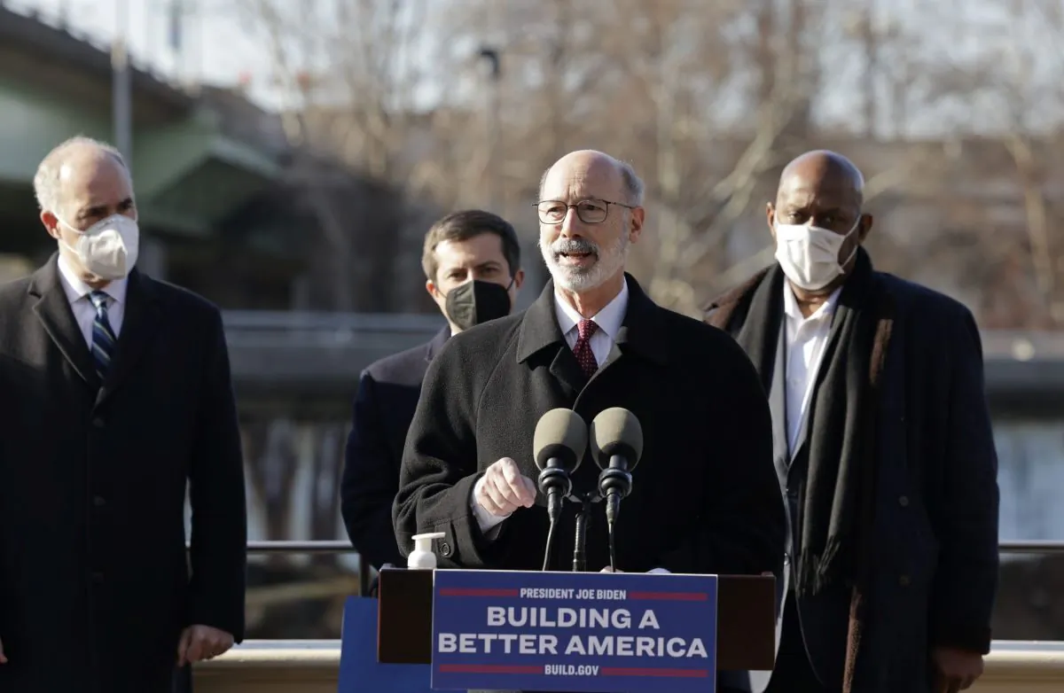 (L–R) U.S. Sen. Bob Casey, U.S. Transportation Secretary Pete Buttigieg, Gov. Tom Wolf, and U.S. Rep. Dwight Evans announce that Pennsylvania will receive $1.6 billion for bridge repair across the commonwealth, in Philadelphia, on Jan. 14, 2022. (Courtesy Commonwealth Media Service)